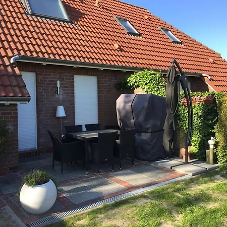 Сasa de vacaciones Ferienhaus Romantik Am Deich Dornum